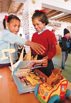 070915-Locals_Nepal_READ_PuthangLibrary_twogirls_Sobel_V
