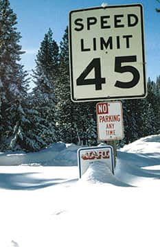 080615-SierraStories-1996_SolsticeSnow_RoadSign