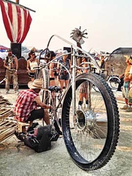 082015-BMArt_FredBesch_Big-bike-2.5-at-burning-man-in-front-of-Helga-