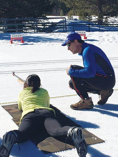 022516-Biathlon_Tom-McElroy-teaching-how-to-shoot_c.Priya