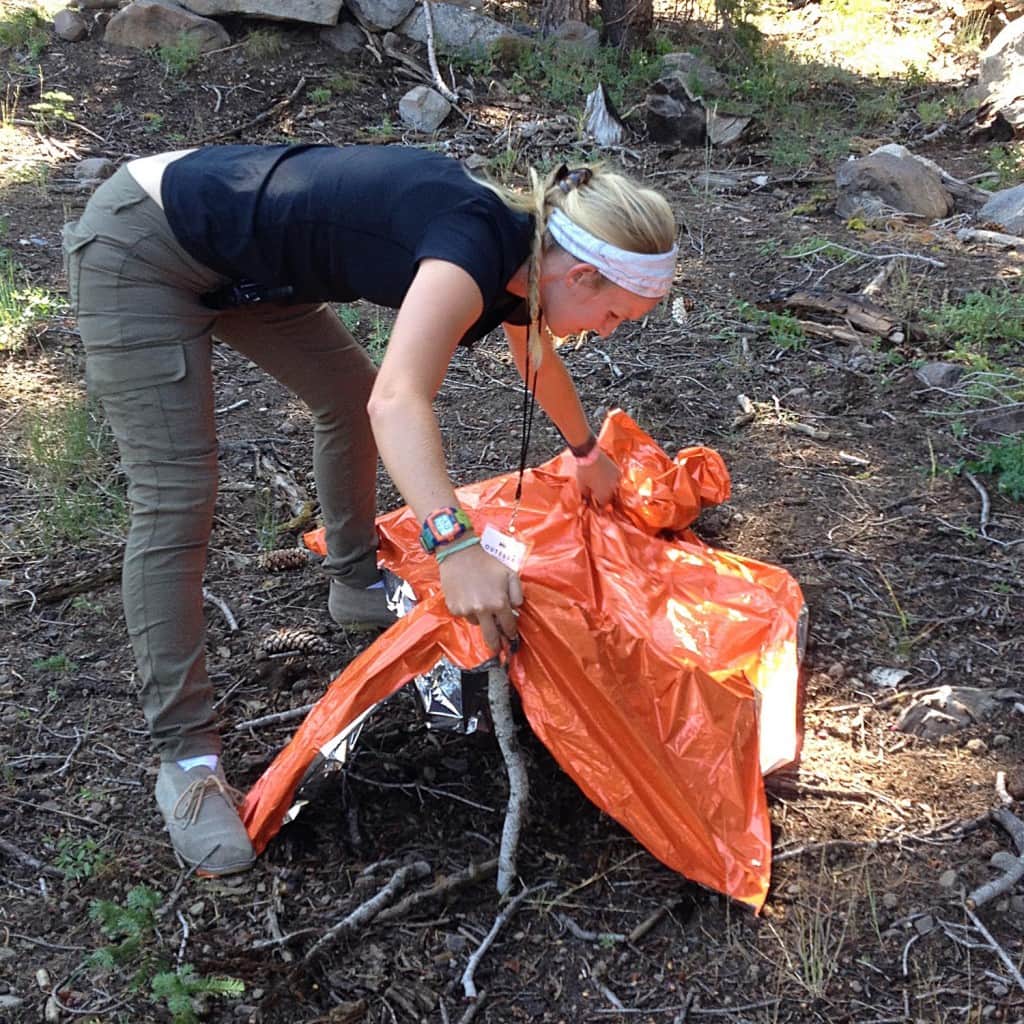 Building an emergency shelter. 